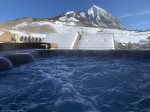 Enjoy a nice soak in the hot tub with views of Mt Crested Butte
